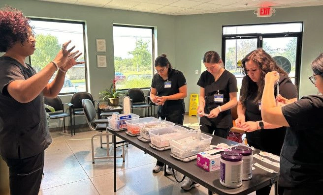 instructor verbally instructing students procedure steps